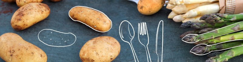 Küchenpost-Banner: Bild von oben. Rechts ragt grüner und weißer Spargel hinein, links liegen Kartoffeln. In der Mitte des Bildes auf einer freien Fläche wurden Messer, Gabel und Löffel in weißer Farbe illustriert. 