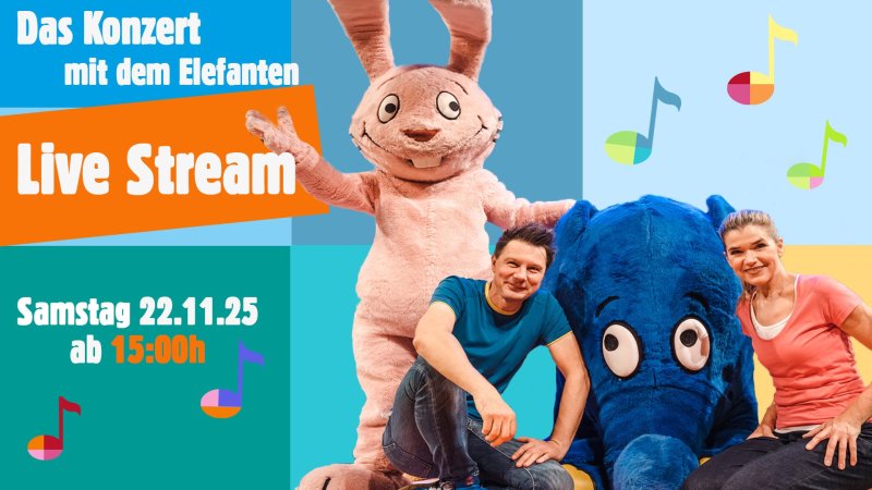 Auf dem Bild ist eine Collage mit einem Mann und einer Frau, die neben einer Person in einem blauen Elefantenkostüm kauern, während dahinter eine Figur in einem rosafarbenen Hasenkostüm steht, und daneben und darunter die Ankündigung "Das Konzert mit dem Elefanten Live Stream Samstag 22.11.25 ab 15:00h" sowie bunte Notensymbole auf farbigen Hintergründen zu sehen sind.